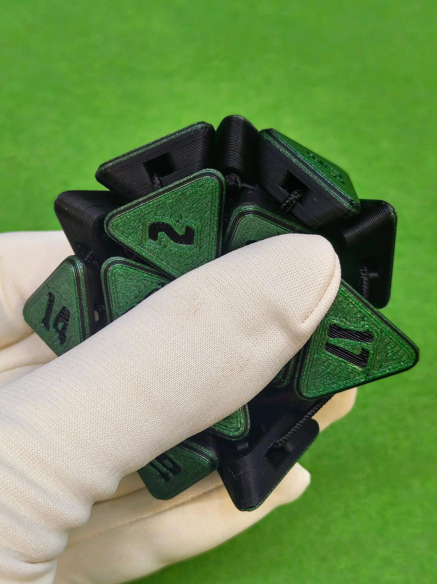 3D printed squishable D20 dice for Dungeons & Dragons and tabletop RPG sessions – soft fidget dice perfect for stress relief and gamer gifts, available in mystery colours for Pathfinder, D&D campaigns, and other roleplaying games.