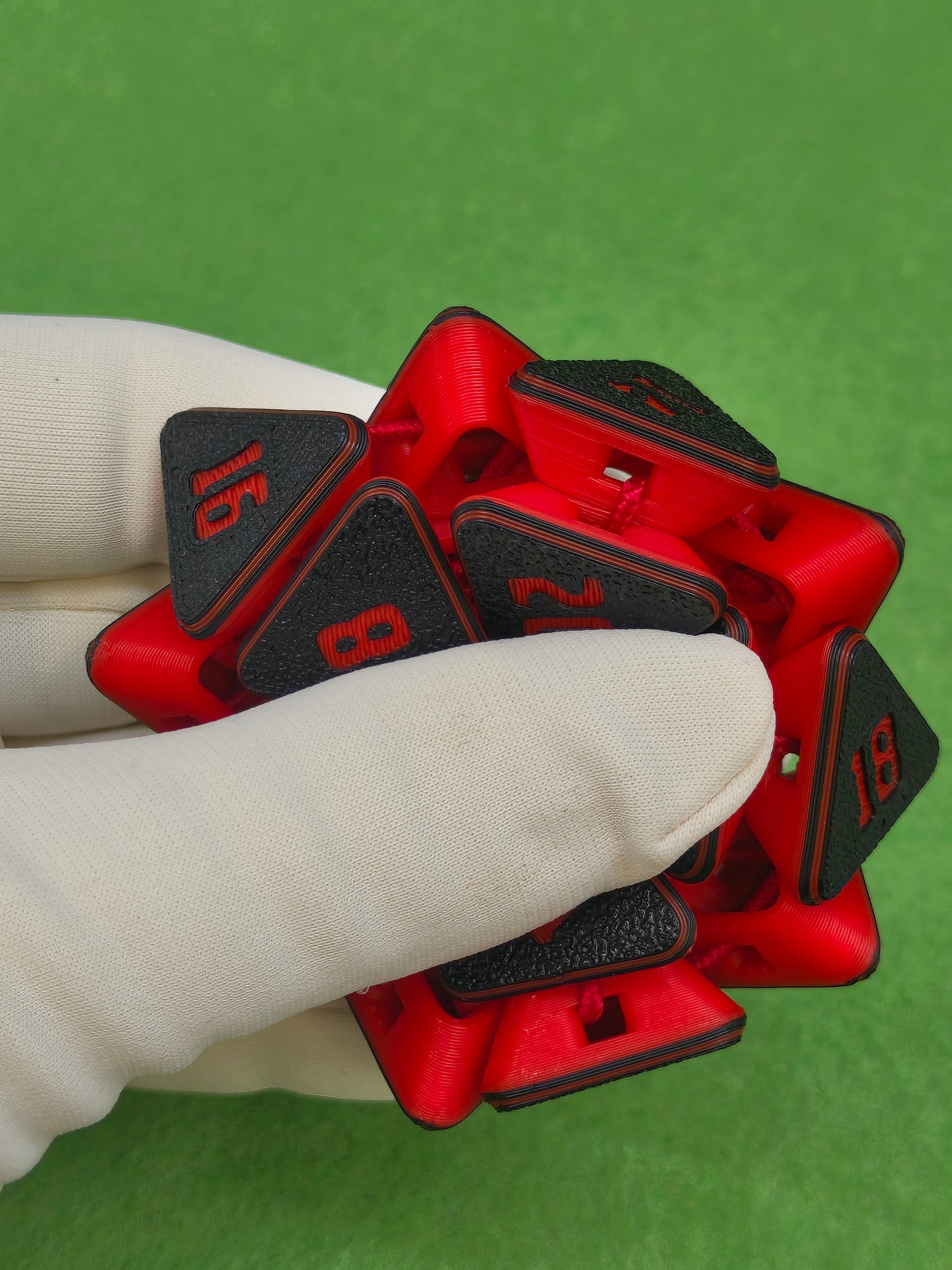 3D printed squishable D20 dice for Dungeons & Dragons and tabletop RPG sessions – soft fidget dice perfect for stress relief and gamer gifts, available in mystery colours for Pathfinder, D&D campaigns, and other roleplaying games.