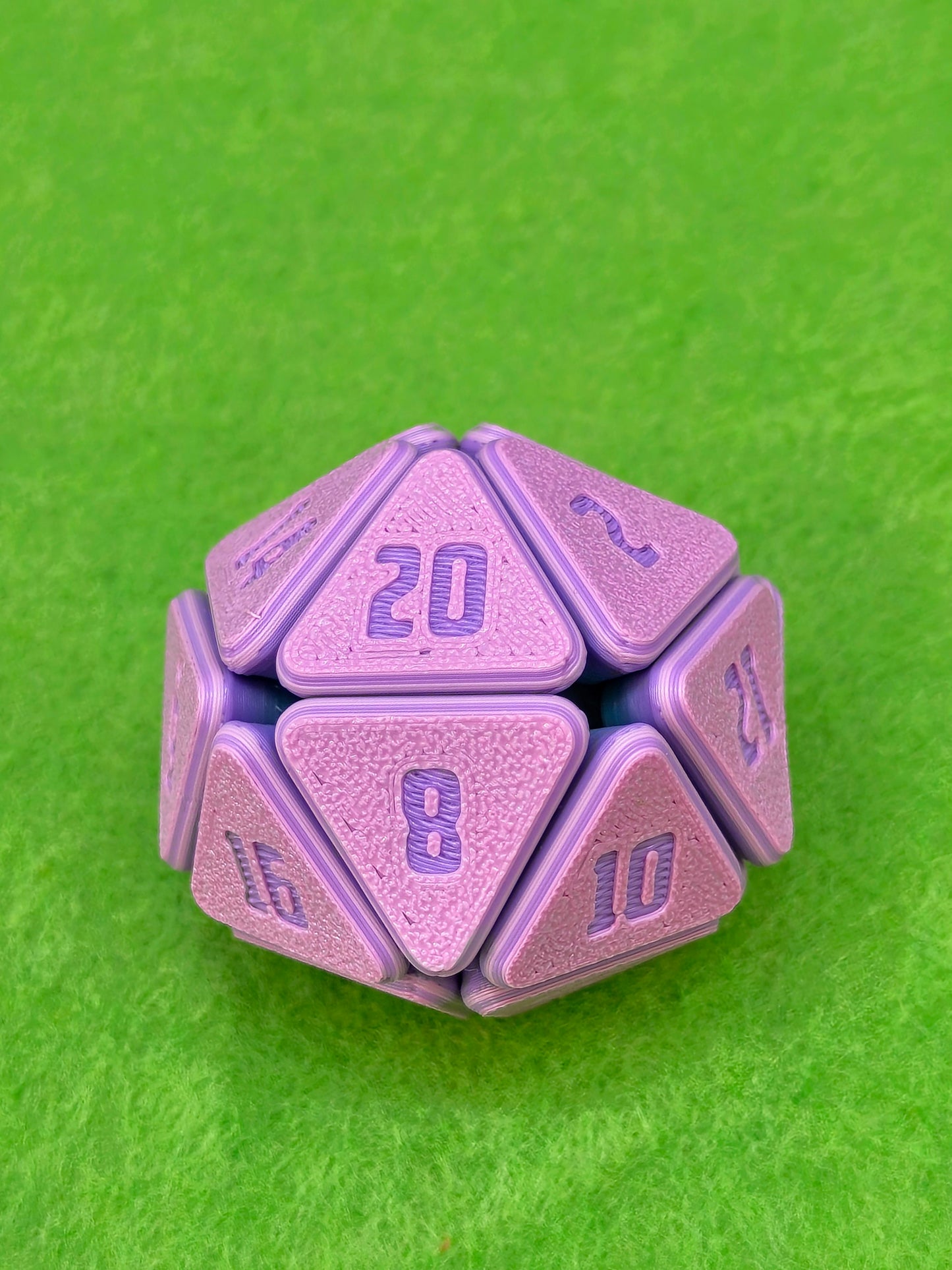 3D printed squishable D20 dice for Dungeons & Dragons and tabletop RPG sessions – soft fidget dice perfect for stress relief and gamer gifts, available in mystery colours for Pathfinder, D&D campaigns, and other roleplaying games.