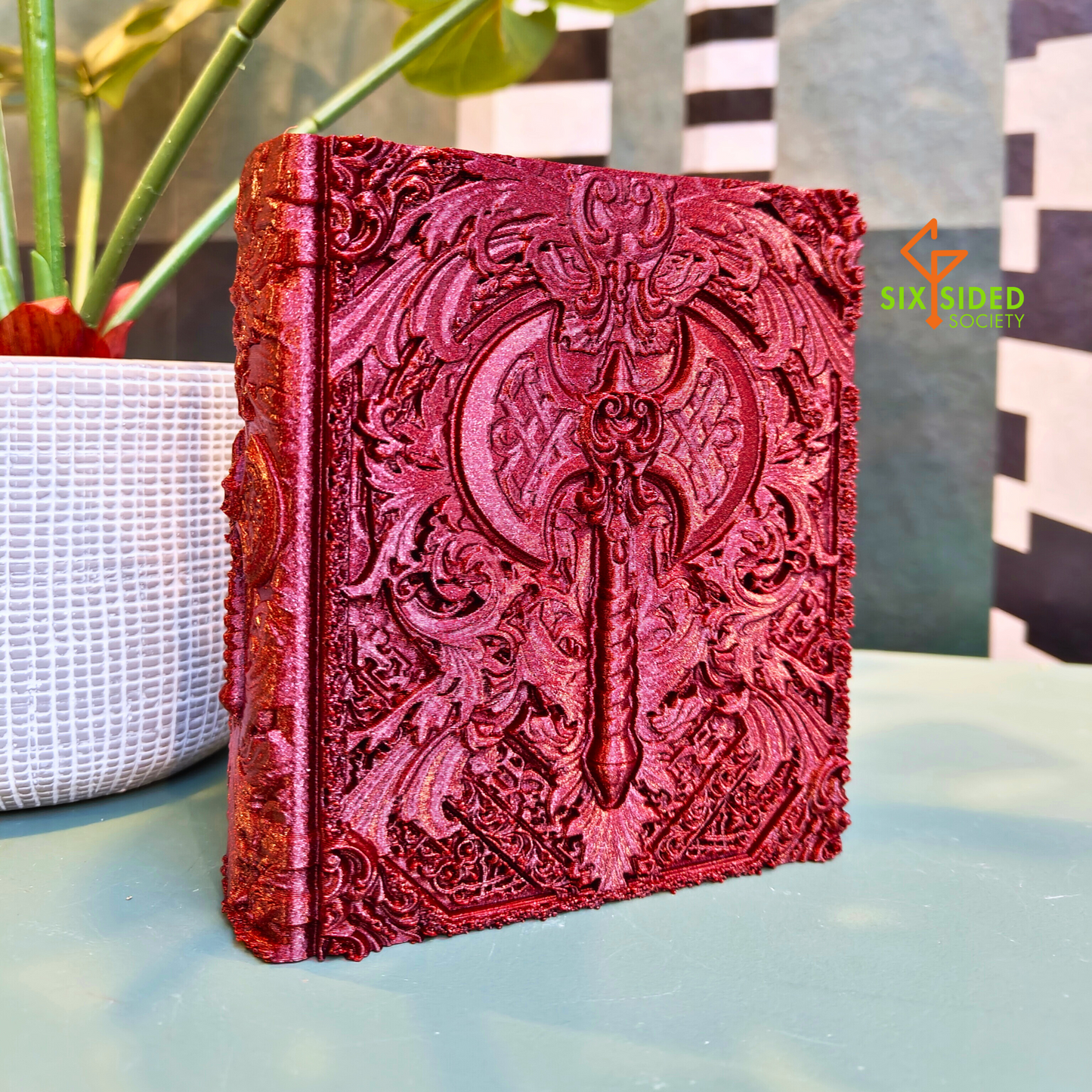 3D-printed book-shaped trinket box for tabletop gaming dice, miniatures, and cards – perfect Dungeons & Dragons storage solution with magnetic closure and nature-inspired design, ideal for RPG players and collectors in Coventry.