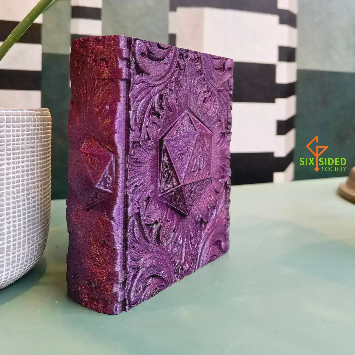 3D-printed book-shaped trinket box for tabletop gaming dice, miniatures, and cards – perfect Dungeons & Dragons storage solution with magnetic closure and nature-inspired design, ideal for RPG players and collectors in Coventry.
