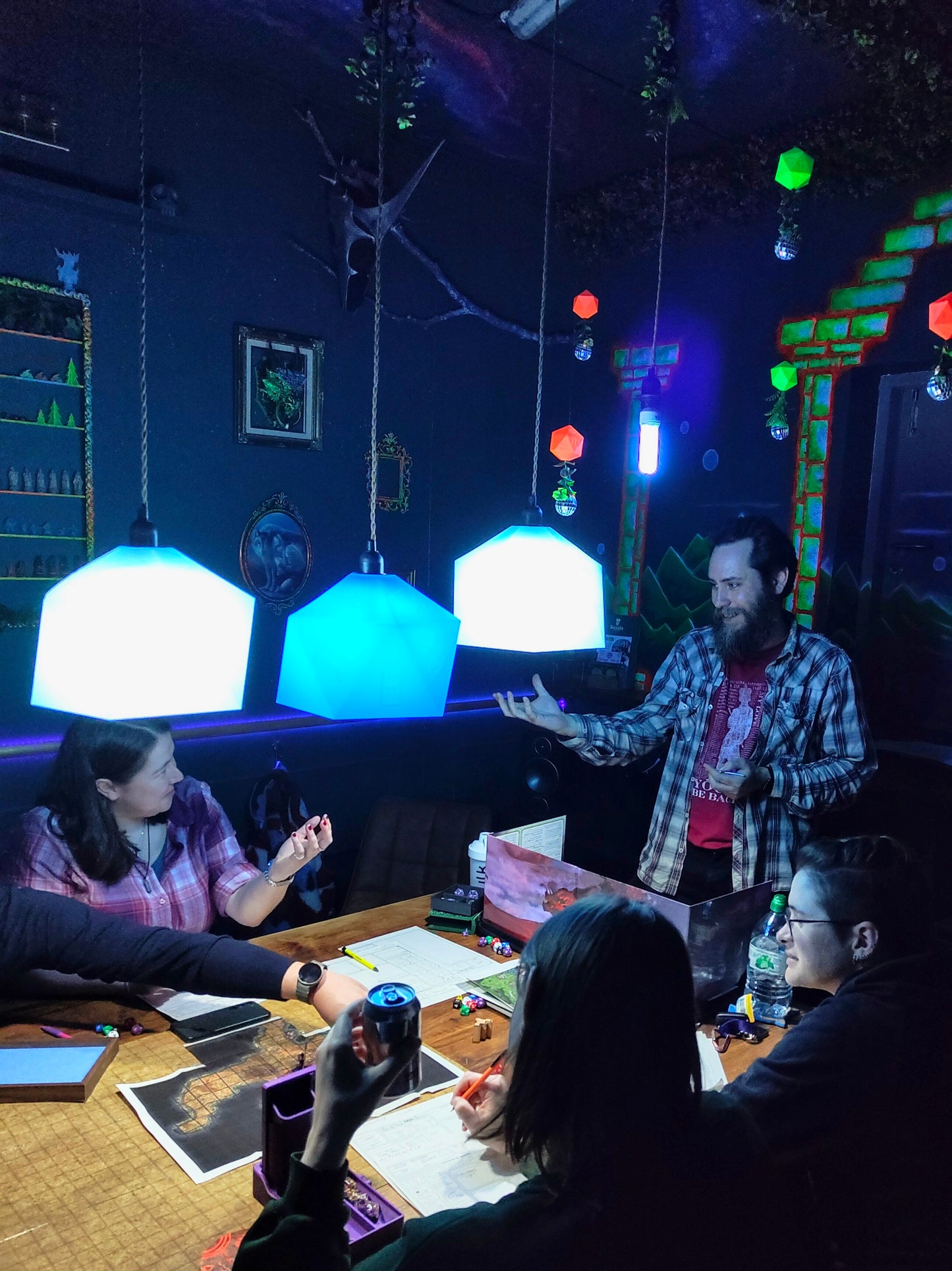 Group playing Dungeons & Dragons tabletop RPG session in Coventry – immersive fantasy gaming experience for all skill levels at Six Sided Society