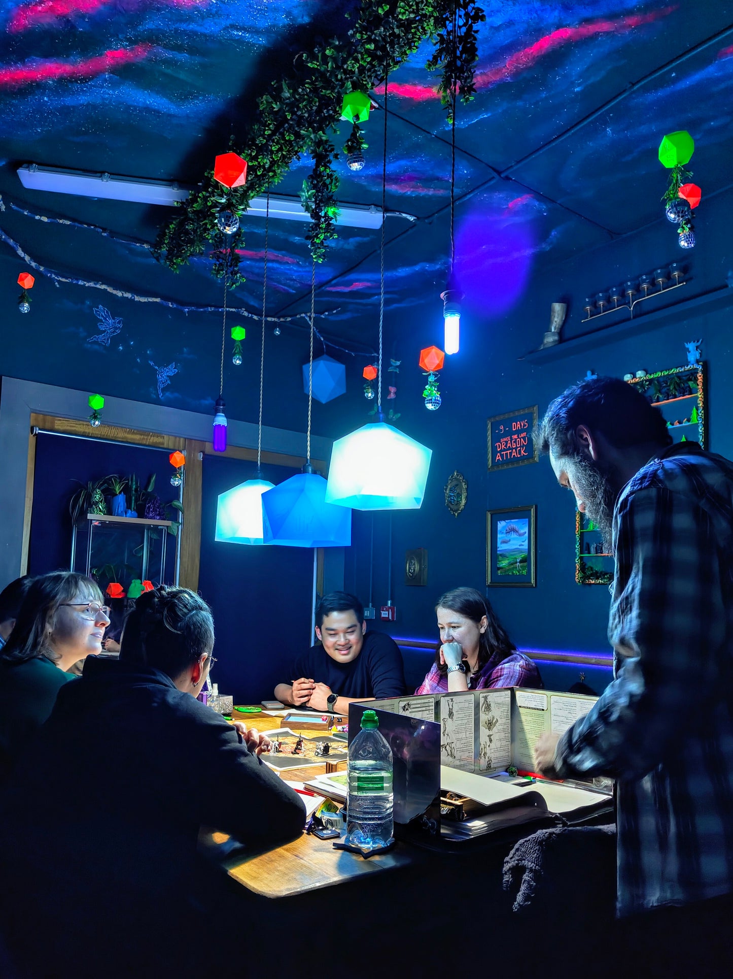 Group playing Dungeons & Dragons tabletop RPG session in Coventry – immersive fantasy gaming experience for all skill levels at Six Sided Society