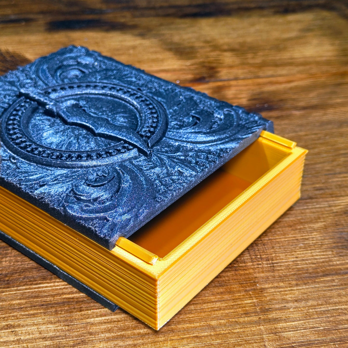 3D-printed book-shaped trinket box for tabletop gaming dice, miniatures, and cards – perfect Dungeons & Dragons storage solution with magnetic closure and nature-inspired design, ideal for RPG players and collectors in Coventry.