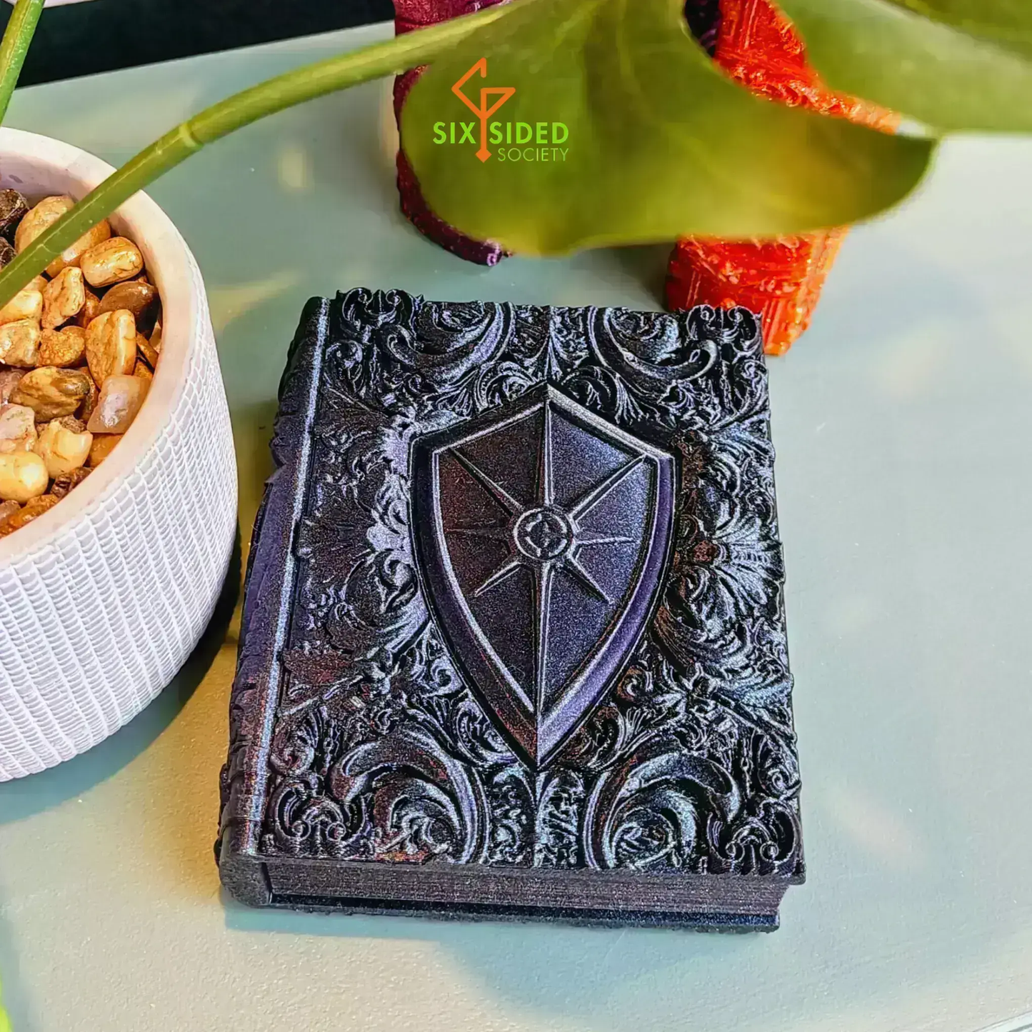 3D-printed book-shaped trinket box for tabletop gaming dice, miniatures, and cards – perfect Dungeons & Dragons storage solution with magnetic closure and nature-inspired design, ideal for RPG players and collectors in Coventry.