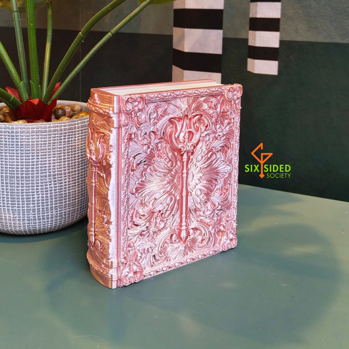 3D-printed book-shaped trinket box for tabletop gaming dice, miniatures, and cards – perfect Dungeons & Dragons storage solution with magnetic closure and nature-inspired design, ideal for RPG players and collectors in Coventry.