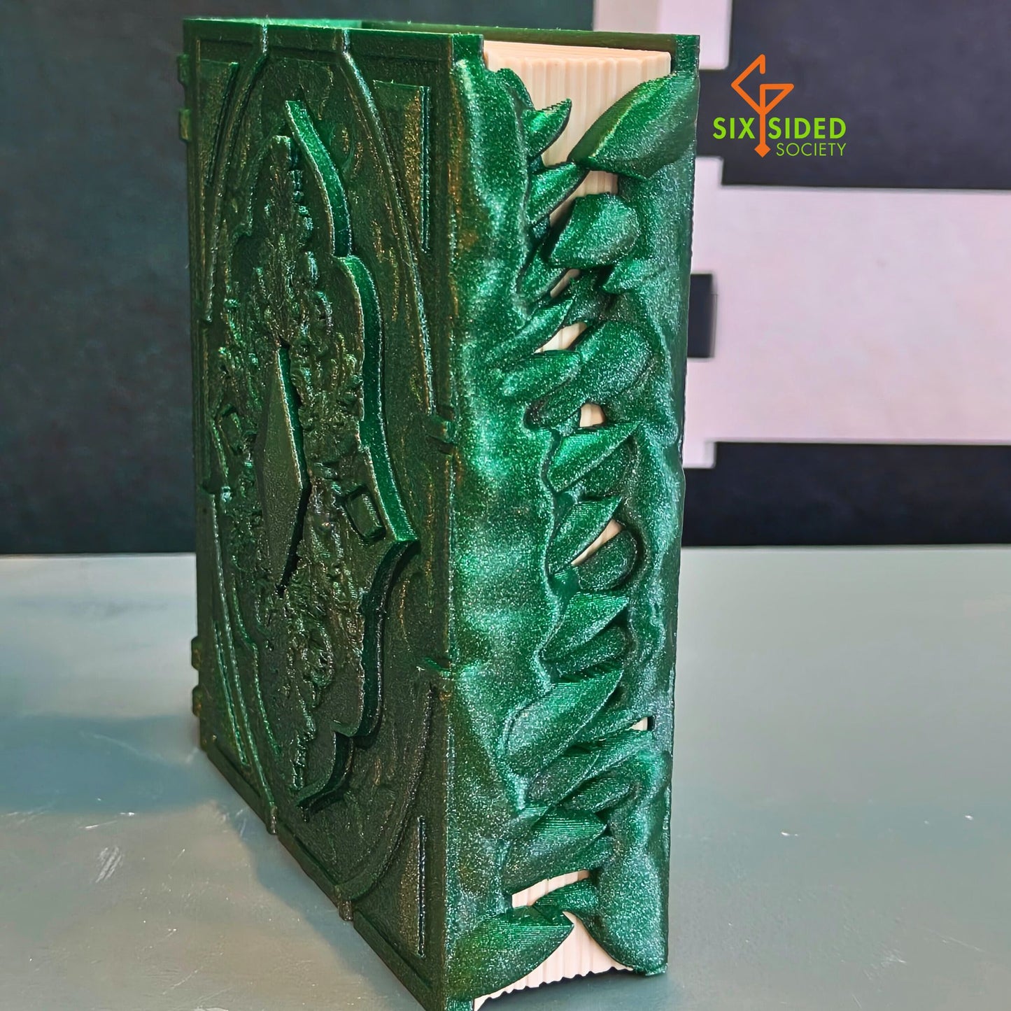 3D-printed book-shaped trinket box for tabletop gaming dice, miniatures, and cards – perfect Dungeons & Dragons storage solution with magnetic closure and nature-inspired design, ideal for RPG players and collectors in Coventry.