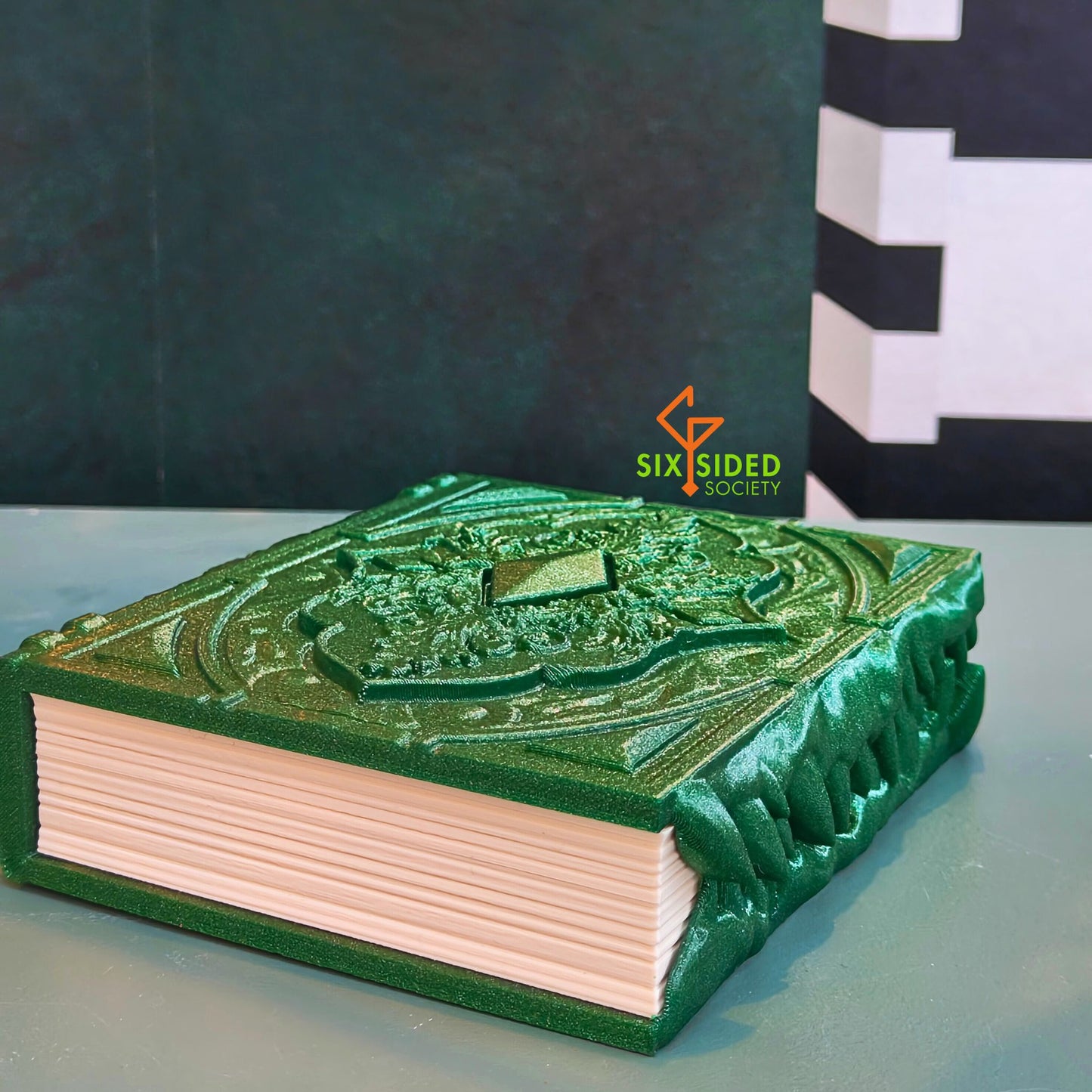 3D-printed book-shaped trinket box for tabletop gaming dice, miniatures, and cards – perfect Dungeons & Dragons storage solution with magnetic closure and nature-inspired design, ideal for RPG players and collectors in Coventry.