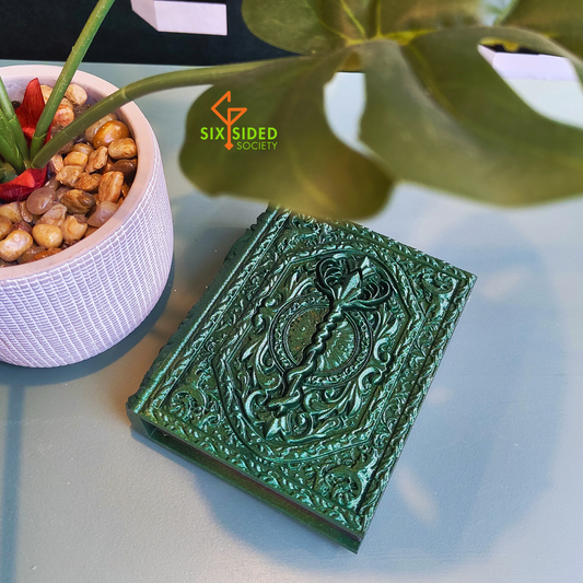 3D-printed book-shaped trinket box for tabletop gaming dice, miniatures, and cards – perfect Dungeons & Dragons storage solution with magnetic closure and nature-inspired design, ideal for RPG players and collectors in Coventry.