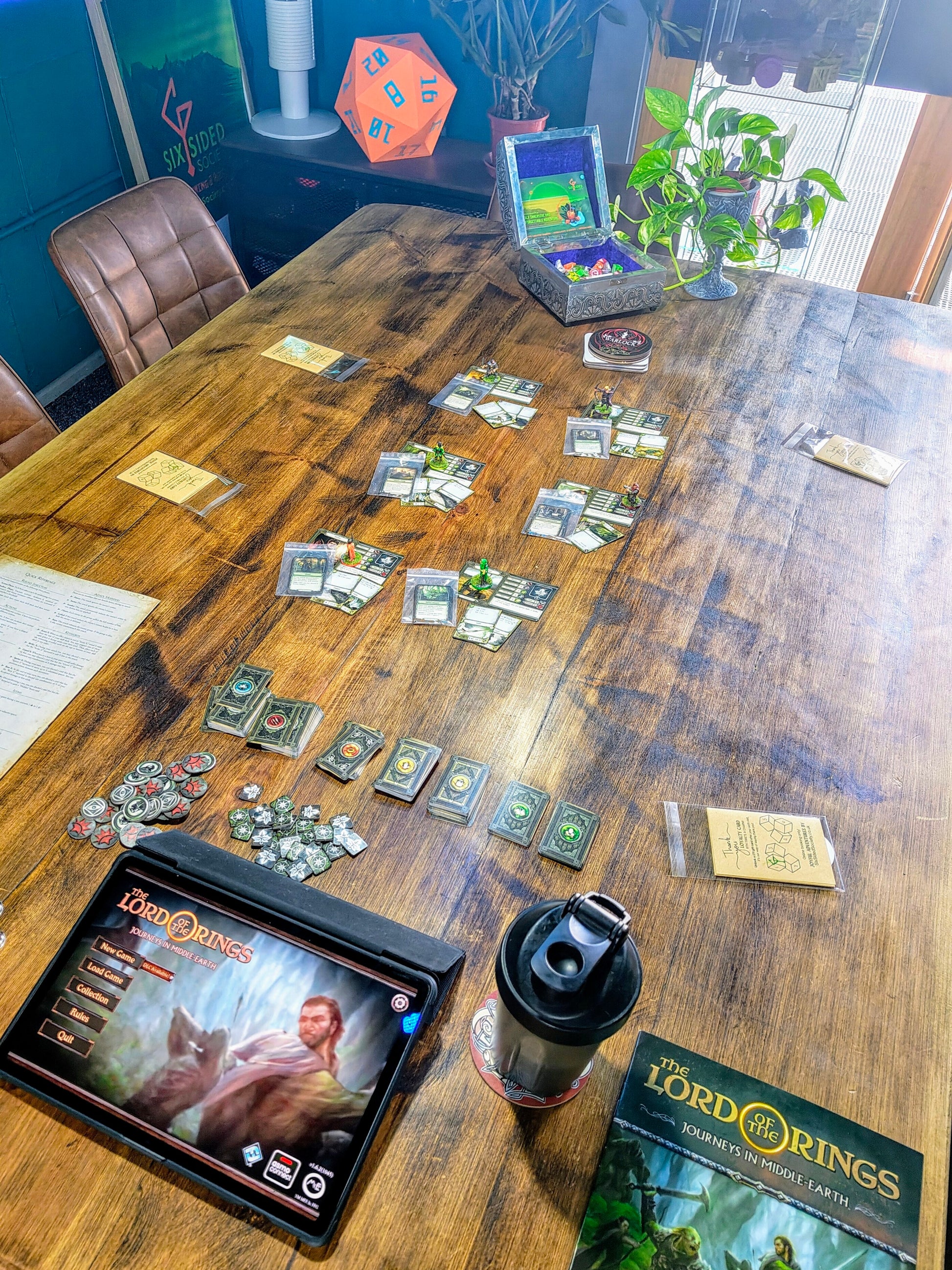 Boardgame social Coventry, tabletop gaming Six Sided Society. The Lord of the Rings - Journeys in Middle-Earth. LOTR One night. Five heroes. Middle-earth awaits. Step into the world of Middle-earth like never before in The Lord of the Rings - a new hybrid board game that blends the strategy and structure of board gaming with the immersive storytelling of tabletop RPGs.
