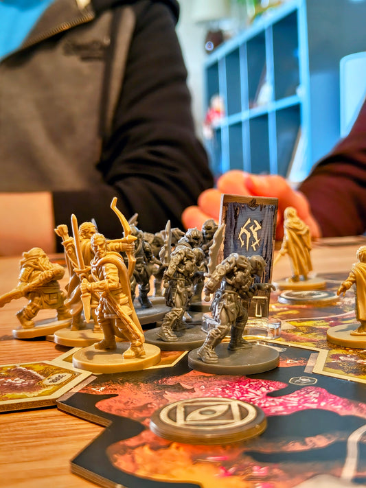 Step into the world of Middle-earth like never before in The Lord of the Rings - a new hybrid board game that blends the strategy and structure of board gaming with the immersive storytelling of tabletop RPGs. Six Sided Society board game social Coventry Fargo Village